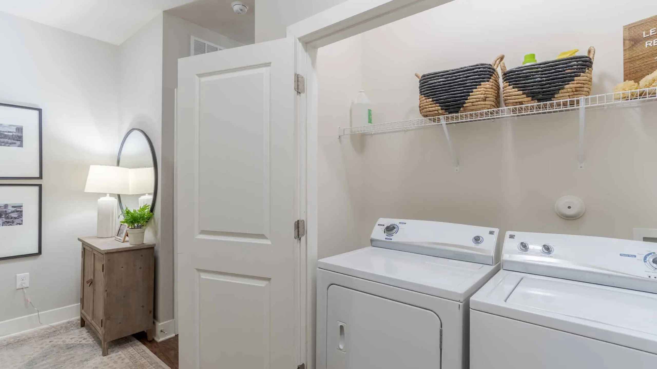 Laundry room at Yugo Charlotte College Downs