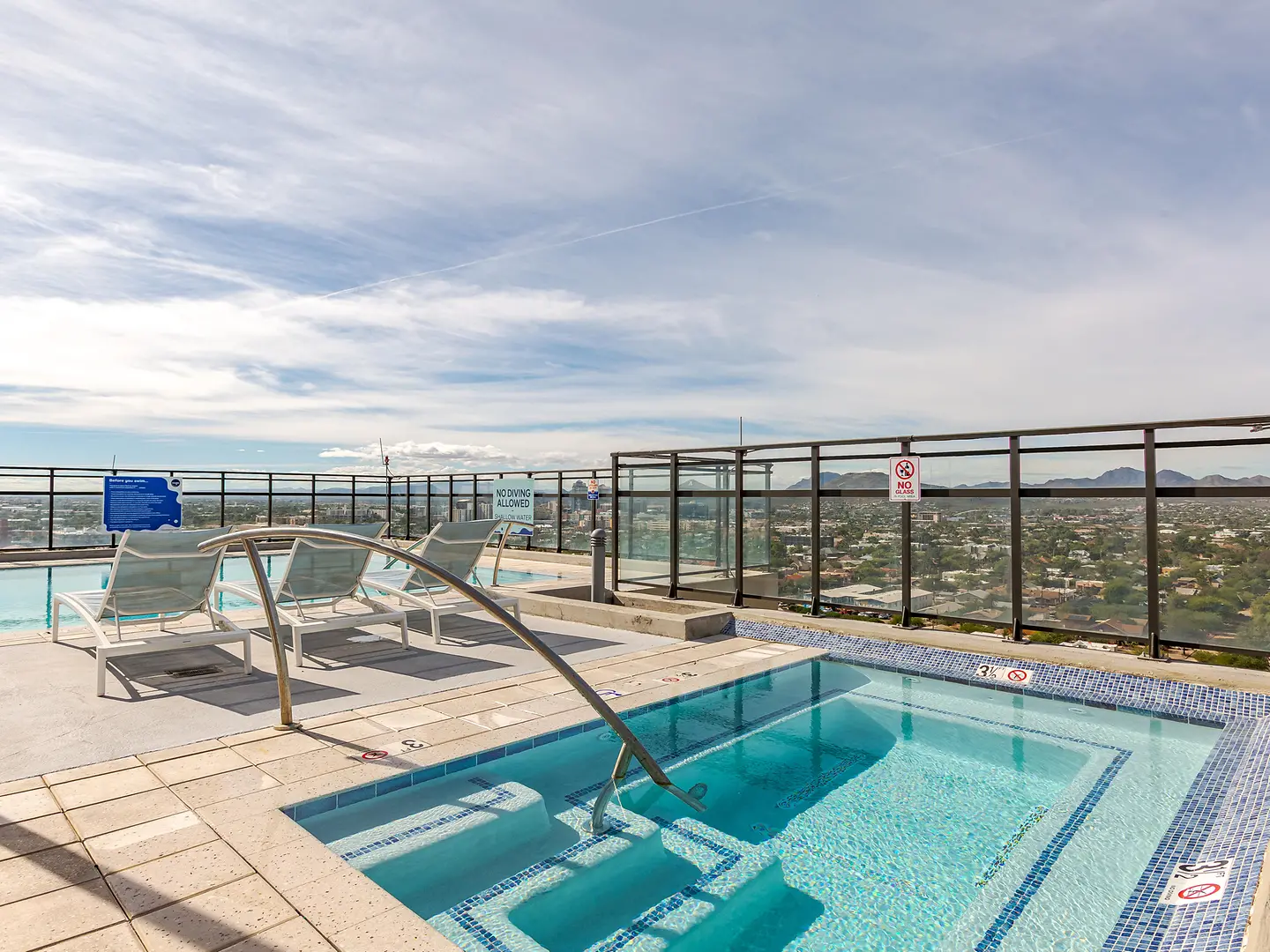 Hot tub beside the pool deck.