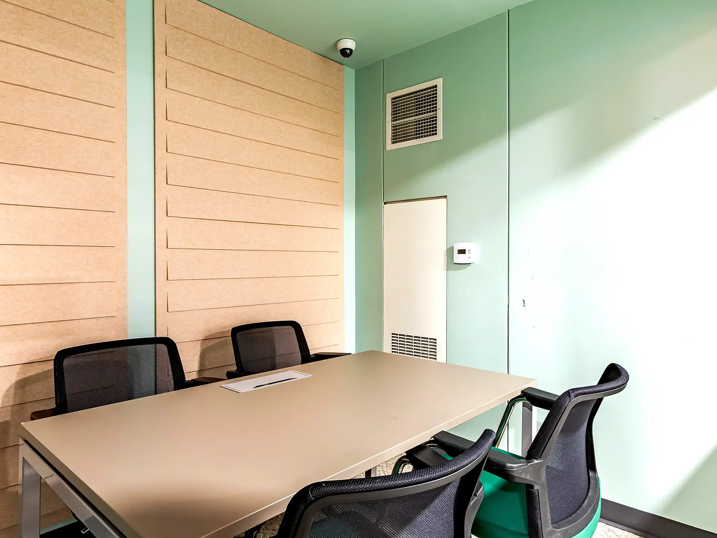 Study room with a shared table and chairs.